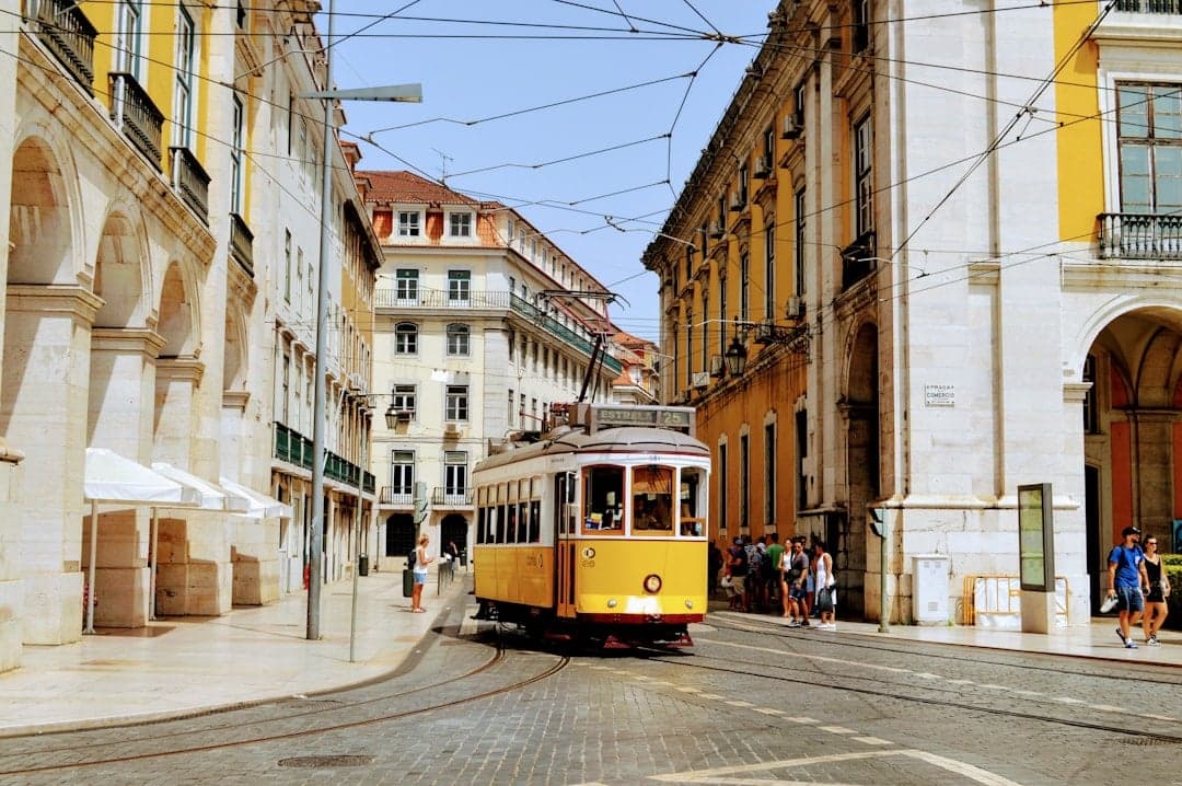 Lisbon Portugal — yellow Tram 28 climbing through the Alfama district, the start of a Spain Portugal Morocco itinerary